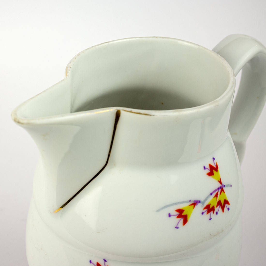 Porcelanowy dzbanek art deco z geometrycznymi kwiatami