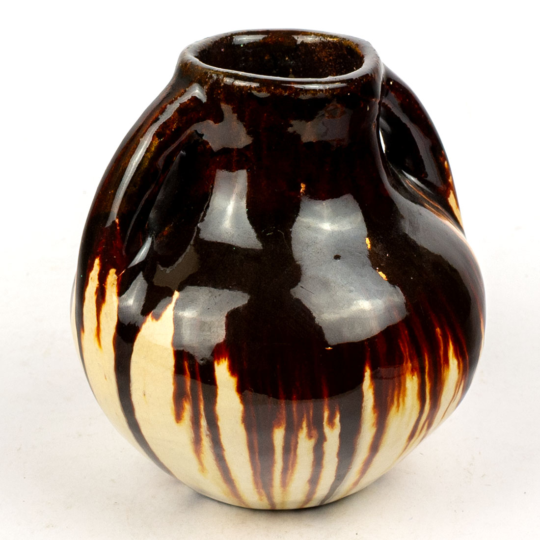 Okrągły ceramiczny wazonik w brązowej i żółtej glazurze